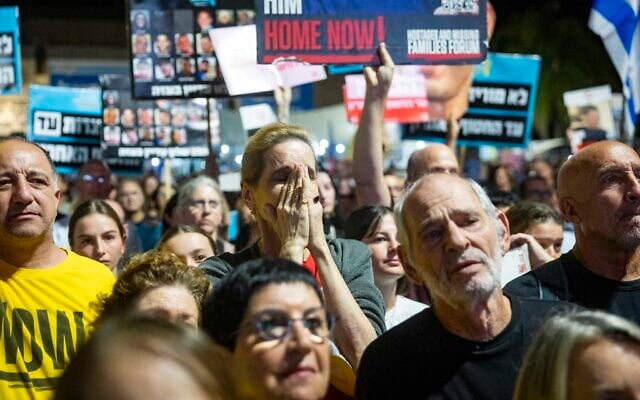 People attend a rally at Hostages Square in Tel Aviv, October 18, 2025. (Chaim Goldberg/Flash90) People attend a rally at Hostages Square in Tel Aviv, October 18, 2025. (Chaim Goldberg/Flash90)