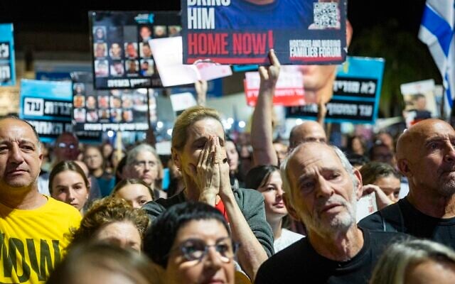 People attend a protest at Hostages Square in Tel Aviv, calling for the release of dead captives held by Hamas, October 18, 2025. (Chaim Goldberg/Flash90)
