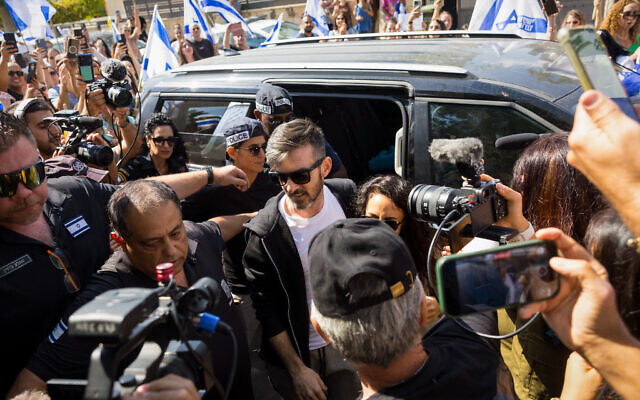 Released hostage David Cunio is greeted as a hero in Yavne, October 19, 2025. (Liron Molodovan/Flash90) Released hostage David Cunio is greeted as a hero in Yavne, October 19, 2025. (Liron Molodovan/Flash90)