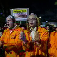 Ultra-Orthodox Jews protest against the conscription of yeshiva students in Jerusalem's Mea Shearim neighborhood, October 19, 2025. (Noam Revkin Fenton/Flash90)