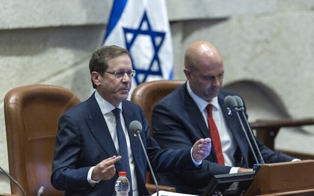 President Isaac Herzog speaks during a plenary session of the opening day of the winter session at the Knesset, October 20, 2025. (Chaim Goldberg/Flash90)