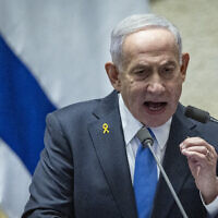 Prime Minister Benjamin Netanyahu speaks during a plenary session of the opening day of the winter session at the Knesset, on October 20, 2025. (Chaim Goldberg/ Flash90)