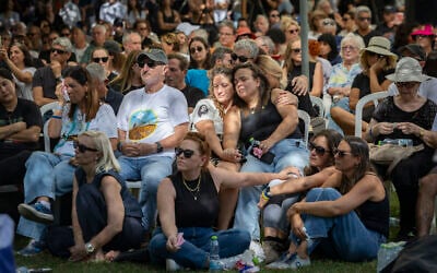 Family and friends attend the funeral ceremony of slain hostage Tamir Adar at Kibbutz Nir Oz on October 23, 2025. (Chaim Goldberg/Flash90)