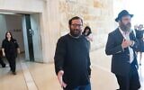 Jonatan Urich (C) seen after a court hearing at the Supreme Court in Jerusalem, October 27, 2025. (Chaim Goldberg/Flash90)
