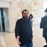 Jonatan Urich (C) seen after a court hearing at the Supreme Court in Jerusalem, October 27, 2025 (Chaim Goldberg/Flash90)