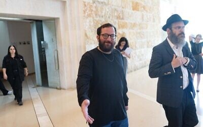 Jonatan Urich (C) seen after a court hearing at the Supreme Court in Jerusalem, October 27, 2025. (Chaim Goldberg/Flash90)