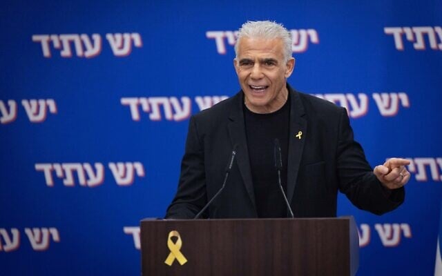 Opposition Leader Yair Lapid chairs a meeting of his Yesh Atid party in the Knesset, October 27, 2025. (Yonatan Sindel/Flash90)