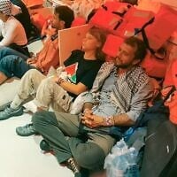 Flotilla activists, including Greta Thunberg, are seen being transported to Israel after their vessels were intercepted by the IDF on October 2, 2025. (Foreign Ministry)