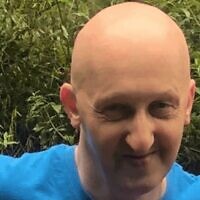 Adrian Daulby, who was killed October 2, 2025, during a terror attack on a synagogue in Manchester, England, in an undated photo (Greater Manchester Police)