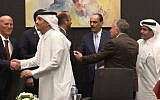 Israeli negotiator Nitzan Alon (far left) shakes hands with Qatar's Prime Minister Mohammed bin Abdulrahman bin Jassim Al Thani in a photo indicating success in the mediated Israel-Hamas negotiations on a Gaza hostage-ceasefire agreement in Sharm el-Sheikh, in the early hours of October 9, 2025. Second from right with back to camera is US special Middle East envoy Steve Witkoff. (Telegram / used in accordance with clause 27a of the copyright law)