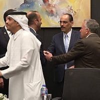 Israeli negotiator Nitzan Alon (far left) shakes hands with Qatar's Prime Minister Mohammed bin Abdulrahman bin Jassim Al Thani in a photo indicating success in the mediated Israel-Hamas negotiations on a Gaza hostage-ceasefire agreement in Sharm el-Sheikh, in the early hours of October 9, 2025. Second from right with back to camera is US special Middle East envoy Steve Witkoff. (Telegram / used in accordance with clause 27a of the copyright law)