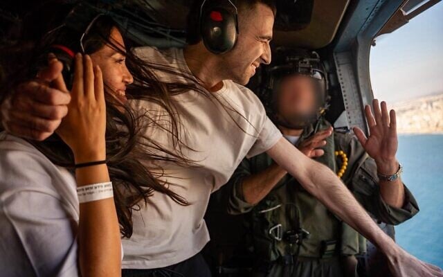 Released hostage Avinatan Or and his girlfriend, ex hostage Noa Argamani, fly in an Israeli Air Force helicopter to a hospital in central Israel, following his release from Hamas captivity on October 13, 2025. (Israel Defense Forces) Released hostage Avinatan Or and his girlfriend, ex hostage Noa Argamani, fly in an Israeli Air Force helicopter to a hospital in central Israel, following his release from Hamas captivity on October 13, 2025. (Israel Defense Forces)