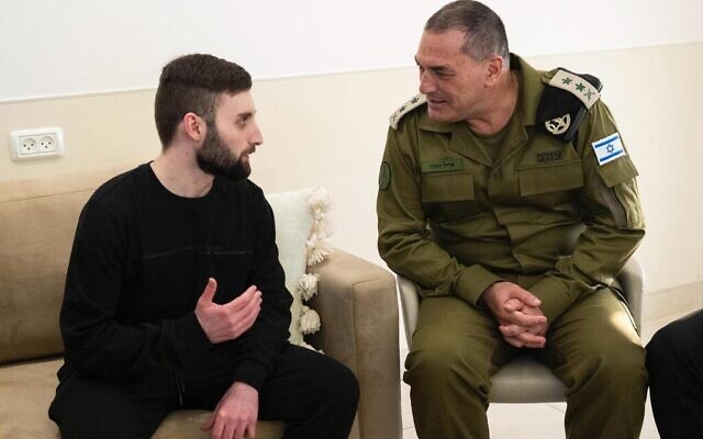 Released hostage Matan Angrest speaks with IDF Chief of Staff Eyal Zamir in the hospital on October 15, 2025, two days after his release from Hamas captivity. (IDF Spokesman)