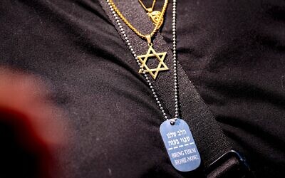 Illustrative: A woman wears a Star of David and a necklace remembering the Israeli hostages during a rally at George Washington University, May 2, 2024. (Andrew Harnik/Getty Images via JTA) Illustrative: A woman wears a Star of David and a necklace remembering the Israeli hostages during a rally at George Washington University, May 2, 2024. (Andrew Harnik/Getty Images via JTA)