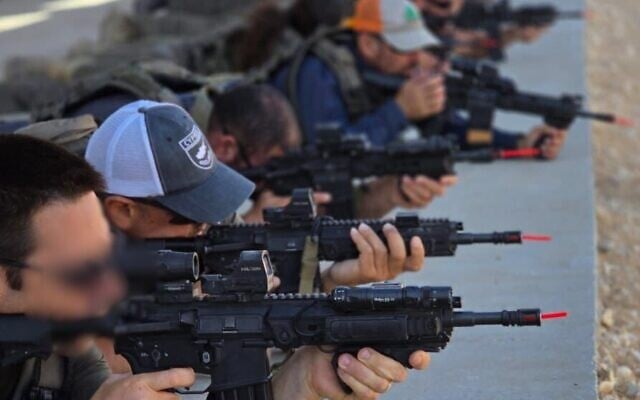 A first responder team from Kibbutz Netiv Ha’asara, near the Gaza border, practices long-distance shooting during a fifth training session at the IDF's Tze'elim base, September 25, 2025. (Ari Briggs, Magen48) A first responder team from Kibbutz Netiv Ha’asara, near the Gaza border, practices long-distance shooting during a fifth training session at the IDF's Tze'elim base, September 25, 2025. (Ari Briggs, Magen48)