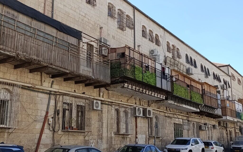 Sukkahs around the Meah Shearim neighborhood in Jerusalem, October 8, 2025 (Zev Stub/Times of Israel)