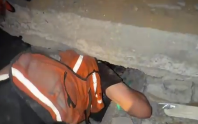 Gazan emergency responders attempt to rescue someone trapped beneath rubble following an Israeli airstrike on Gaza City on October 9, 2025. (Screenshot/Telegram) Gazan emergency responders attempt to rescue someone trapped beneath rubble following an Israeli airstrike on Gaza City on October 9, 2025. (Screenshot/Telegram)