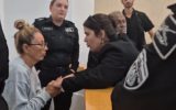Gaza flotilla activist Reyes Rigo Cervilla (left), accused of attacking a prison guard, appears at a court hearing after accepting a plea bargain with prosecutors, in the Beersheba Magistrate's Court on October 10, 2025. (Screenshot/Ynet)