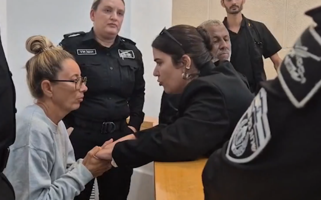 Gaza flotilla activist Reyes Rigo Cervilla (left), accused of attacking a prison guard, appears at a court hearing after accepting a plea bargain with prosecutors, in the Beersheba Magistrate's Court on October 10, 2025. (Screenshot/Ynet) Gaza flotilla activist Reyes Rigo Cervilla (left), accused of attacking a prison guard, appears at a court hearing after accepting a plea bargain with prosecutors, in the Beersheba Magistrate's Court on October 10, 2025. (Screenshot/Ynet)