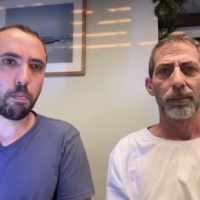 Former hostage Tal Shoham, left, and Ilan Dalal, father of hostage Guy Gilboa-Dalal, address journalists over Zoom on October 12, 2025. (Screenshot/Amplify)