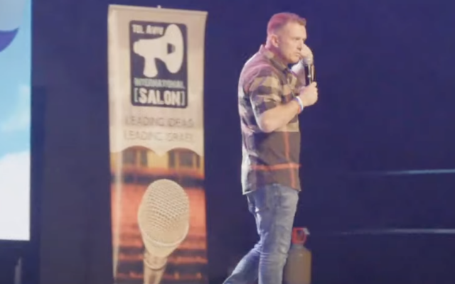 British anti-Islam activist Tommy Robinson speaks in Tel Aviv, on October 18, 2025. (Screen capture via Avi Yemini on YouTube)