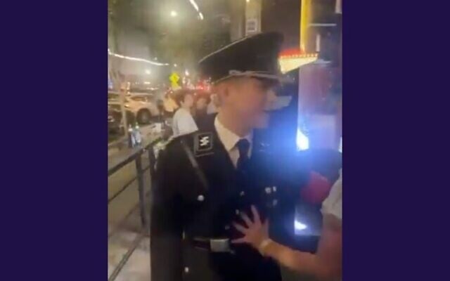 A man wearing a Nazi uniform assaults a woman outside of a bar in downtown Athens, Georgia. (Screenshot via JTA) A man wearing a Nazi uniform assaults a woman outside of a bar in downtown Athens, Georgia. (Screenshot via JTA)