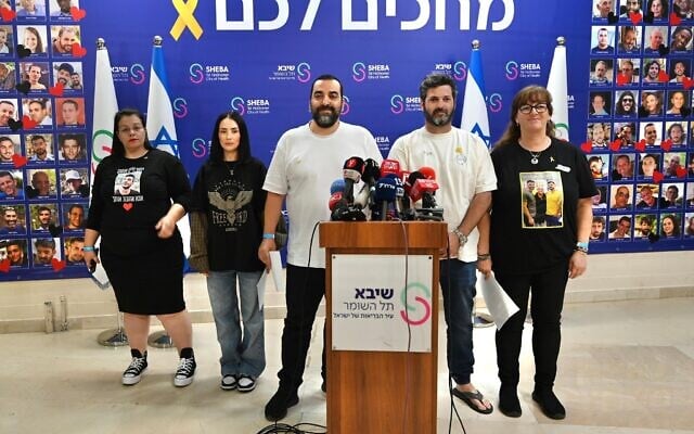 From L-R: Miri Ben Ami, mother of freed hostage; Rivka Bohbot, wife of freed hostage Elkana Bohbot; Yosef Haim Ohana Avi Ohana, the father of released hostage Yosef Chaim Ohana; Liran Berman, brother of freed hostages Gali and Ziv Berman; and Maccabit Meir, the Bermans' aunt, speaking at Sheba Hospital on October 14, 2025. (Credit: Oriel Even Sapir/Hostages and Missing Families Forum)