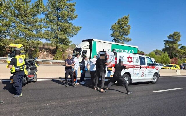 Paramedics arrive ar the scene of a shooting that injured three men on Route 443 on October 15, 2025. (Magen David Adom)