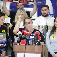 Sylvia Cunio, center, stands flanked by Sharon Alony Cunio (R) and Arbel Yehoud (L) at Sheba Medical Center, on October 15, 2025, after the release of her sons David and Ariel Cunio from Hamas captivity days earlier. (Alon Gilboa/Hostages and Missing Families Forum)
