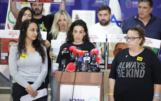 Arbel Yehoud (center) stands flanked by Sharon Alony Cunio (L) and Sylvia Cunio,at Sheba Medical Center, on October 15, 2025, after the release of her partner, Ariel Cunio, from Hamas captivity days earlier. (Alon Gilboa/Hostages and Missing Families Forum)