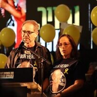 Ronen and Orna Neutra, parents of Omer Neutra, killed on October 7, 2023, his body still held in Gaza, at the October 18, 2025 rally at Tel Aviv's Hostages Square. (Tzachi Dovrat/Israeli Pro-Democracy Protest Movement)