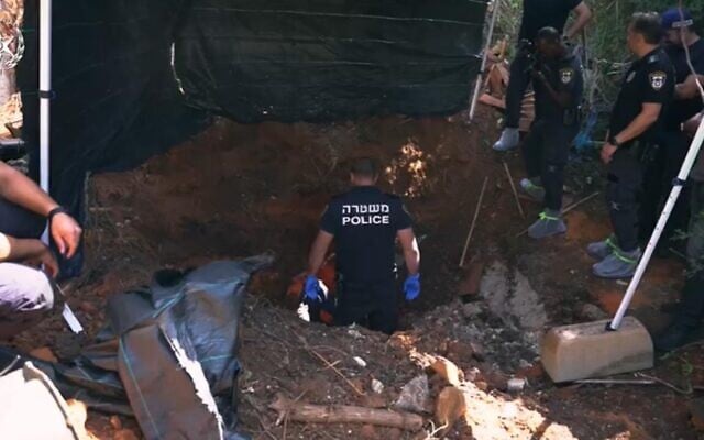 Police seen searching for the body of a Holocaust survivor who was allegedly buried in the backyard of her daughter's home on a picture released on October 20, 2025 (Israel Police)