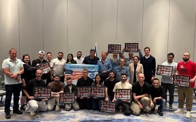 US envoy Steve Witkoff and Jared Kushner meet with released hostages Omri Miran, Gal Berman, Ziv Berman, Yosef Chaim Ohana, Matan Angrest, Bar Kuperstein, Segev Kalfon, Nimrod Cohen, and Eitan Horn in Tel Aviv, October 21, 2025. (Hostages and Missing Families Forum)