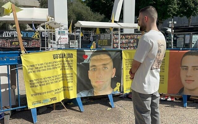 Released hostage Matan Angrest visits Tel Aviv's Hostages Square on October 21, 2025, for the first time since his return home (Hostage and Missing Families Forum)