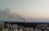 A fire lit to burn waste in the West Bank, as seen from the northern Israeli town of Harish, October 2025. (Dolev Hilell)