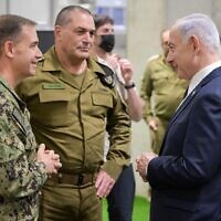 Prime Minister Benjamin Netanyahu visits the Civil-Military Coordination Center in Kiryat Gat on October 29, 2025, meeting  IDF chief Lt. Gen. Eyal Zamir (center) and CENTCOM chief Adm. Brad Cooper (left). (Maayan Toaf/GPO)