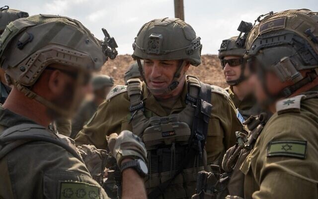IDF Chief of Staff Lt. Gen. Eyal Zamir (center) speaks with officers in the Gaza Strip, October 9, 2025. (Israel Defense Forces) IDF Chief of Staff Lt. Gen. Eyal Zamir (center) speaks with officers in the Gaza Strip, October 9, 2025. (Israel Defense Forces)