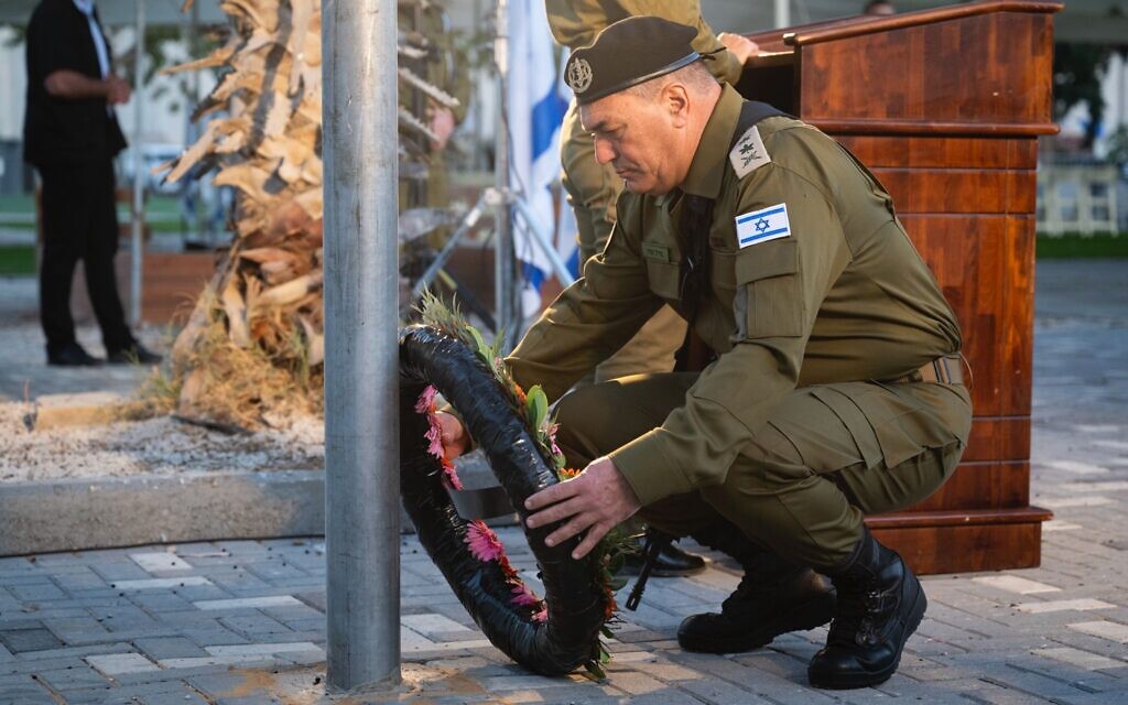 IDF Chief of Staff Lt. Gen. Eyal Zamir lays a wreath during a ceremony at the Nahal Oz base, marking the Hebrew anniversary of the October 7 onslaught, October 16, 2025. (Israel Defense Forces)