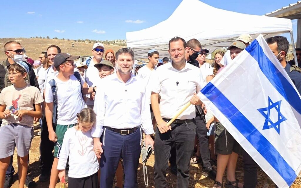 Finance Minister Bezalel Smotrich (c) joins a celebration in the Samaria region of the northern West Bank, marking 50 years since the founding of the Kedumim settlement there, October 8, 2025. (Roei Hadi)