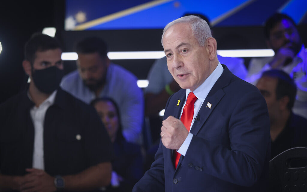 Prime Minister Benjamin Netanyahu appears on Channel 14's 'The Patriots,' in Modi'in on October 18, 2025. (Aloni Mor/Flash90)