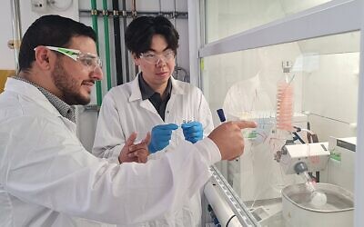 Shady Farah, left, head of the Farah Laboratory for Advanced Functional/Medicinal Polymers & Smart Drug Delivery Technologies at the Technion-Israel Institute of Technology's Wolfson Faculty of Chemical Engineering and PhD Student Qi Wu with their hydrogel inspired by mollusks. (Courtesy)