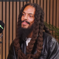 Bob Vylan front man Pascal Robinson-Foster appears on The Louis Theroux Podcast, October 1, 2025. (Screenshot, YouTube)