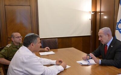 Prime Minister Benjamin Netanyahu holds his first meeting with new Shin Bet chief David Zini on October 5, 2025. (Amos Ben Gershom/GPO)