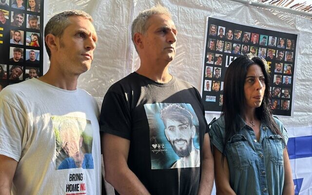 Hostage family members Udi Goren (left), Michel Illouz (center) and Einav Zangauker (right) hold a press conference outside the home of Prime Minister Benjamin Netanyahu, calling on him to push forward with a US-backed hostage-ceasefire proposal on October 5, 2025. (Charlie Summers/Times of Israel) Hostage family members Udi Goren (left), Michel Illouz (center) and Einav Zangauker (right) hold a press conference outside the home of Prime Minister Benjamin Netanyahu, calling on him to push forward with a US-backed hostage-ceasefire proposal on October 5, 2025. (Charlie Summers/Times of Israel)