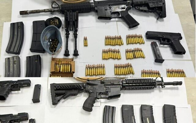 Weapons and ammunition seized by police forces in Rahat following the fatal shooting of a young man in the city on October 4, 2025. (Israel Police) Weapons and ammunition seized by police forces in Rahat following the fatal shooting of a young man in the city on October 4, 2025. (Israel Police)