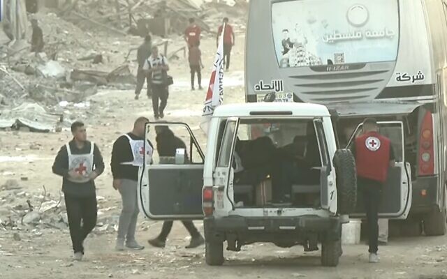 Red Cross vehicles and personnel in the Gaza Strip ahead of the release of hostages on October 13, 2025 (Screen grab/Al Jazeera)