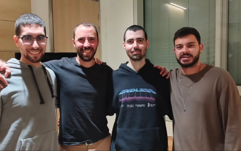 Evyatar David, left, Tal Shoham, Gal Gilboa Dalal (second from right) and Omer Wenkert on October 18, 2025 at Beilinson Hospital. (Courtesy)