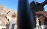Border Police officers detain a suspect who allegedly carried out a car-ramming attack at the West Bank's Bidu Checkpoint, October 4, 2025. (Israel Police)