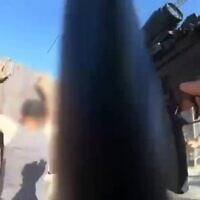 Border Police officers detain a suspect who allegedly carried out a car-ramming attack at the West Bank's Bidu Checkpoint, October 4, 2025. (Israel Police)