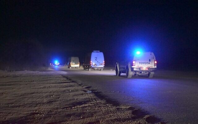 Police escort the caskets said to contain the bodies of two hostages from the Gaza border to the Abu Kabir forensic institute in Tel Aviv, early October 19, 2025. (Israel Police)